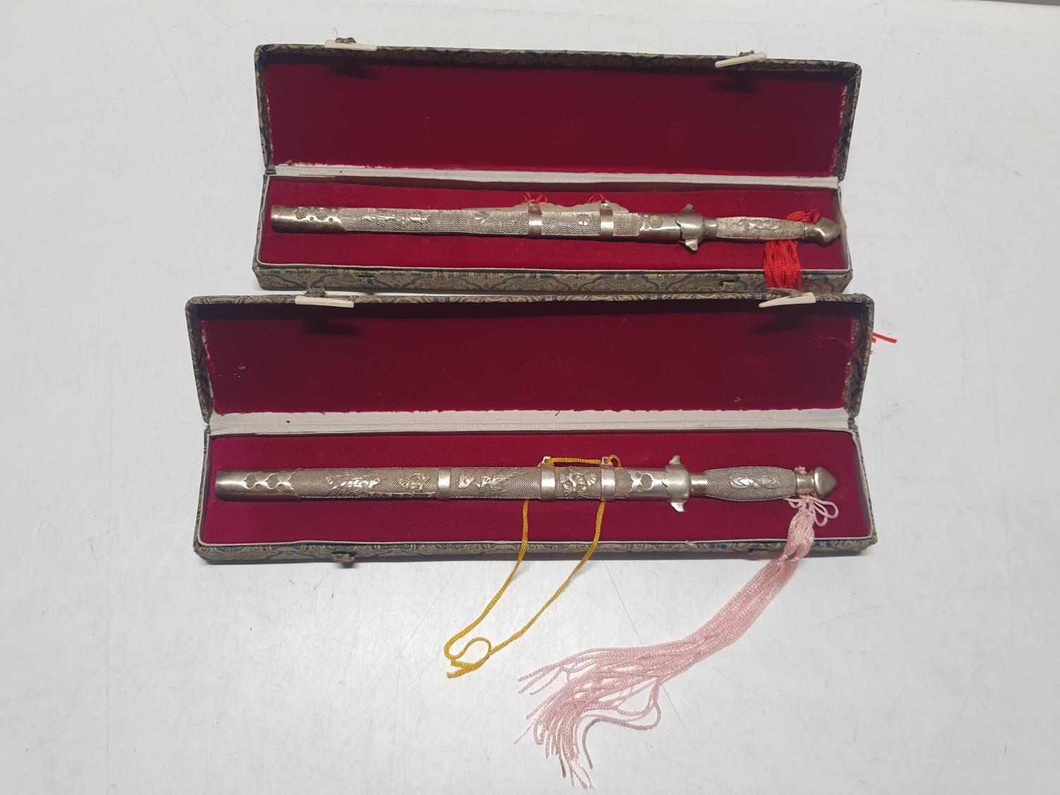 Two cased oriental letter openers