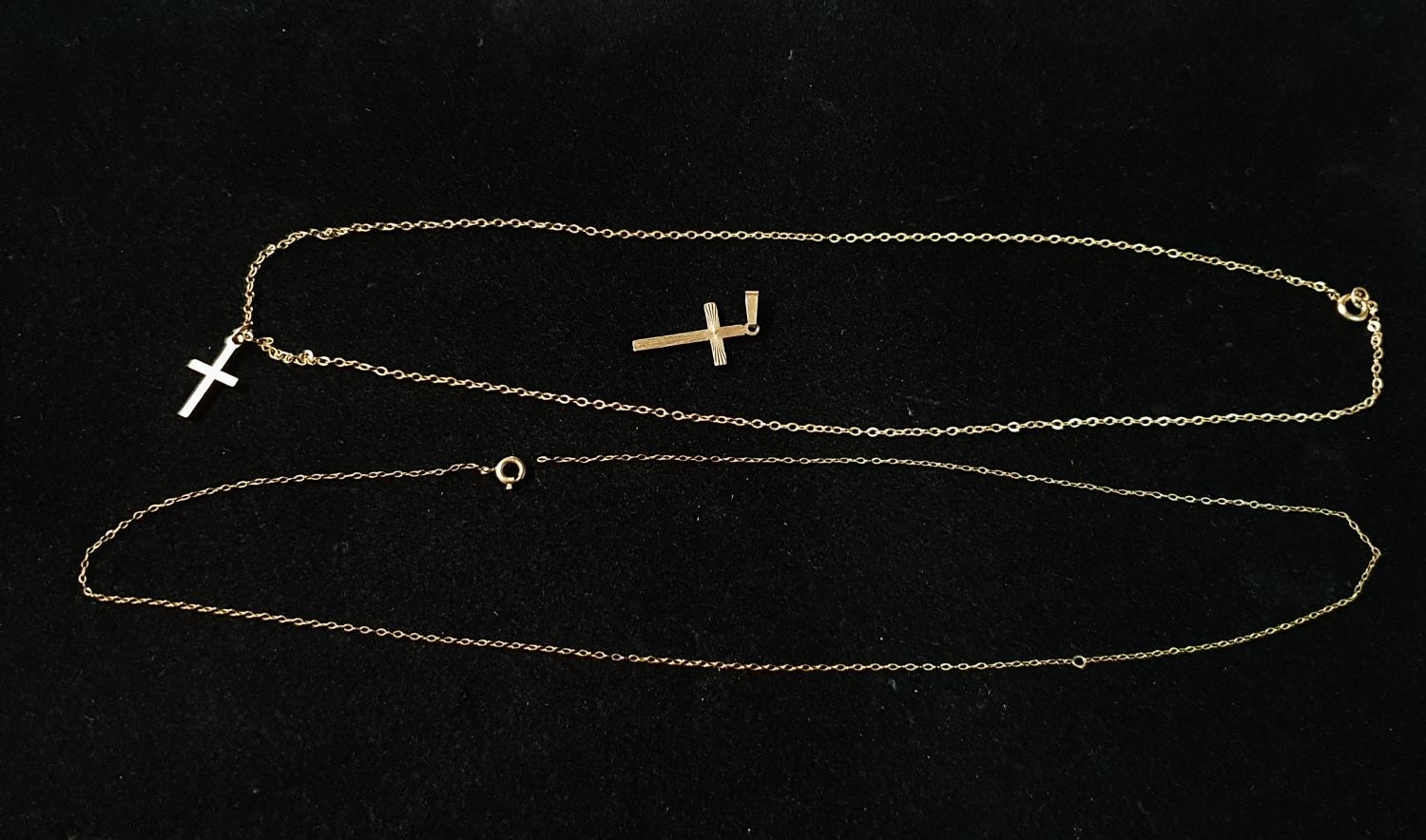 Two 9ct Gold chains (one for scrap) with two crucifix pendants. Total weight 3.19g