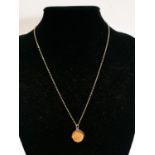 A 9ct Gold chain and pendant. 2.18g
