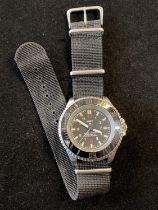 A gents MWC Military Automatic divers wristwatch ticking at time of cataloguing