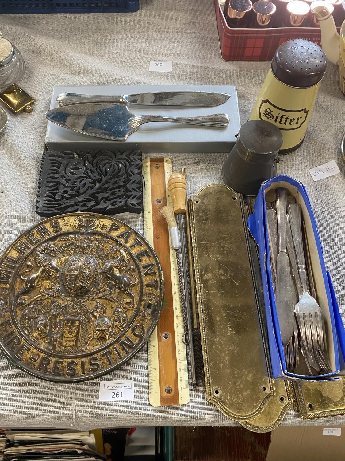 A job lot of assorted collectables including brass doorplates etc, shipping unavailable