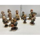 A group of Goebel ceramic figure.Shipping unavailable