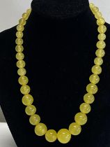 A Art Deco period Vaseline glass necklace