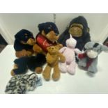 A selection of soft toys including Keel.