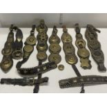 A job lot of vintage and antique leather horse brasses