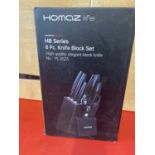 A Homaz eight piece knife block set, (UK post only)