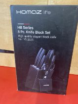 A Homaz eight piece knife block set, (UK post only)