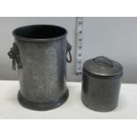 A W & Co. pewter wine bottle holder and a pewter storage canister