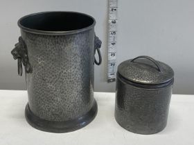 A W & Co. pewter wine bottle holder and a pewter storage canister