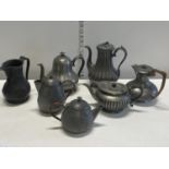 A job lot of pewter teapots