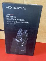 A Homaz eight piece knife block set, (UK post only)