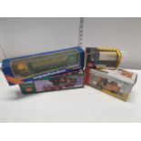 Four boxed die cast models including Corgi