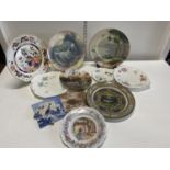 A assortment of collectors plates including Royal Doulton, Bramley Hedge and other.Shipping