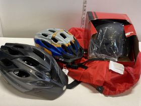 Three new bike helmets.Shipping unavailable