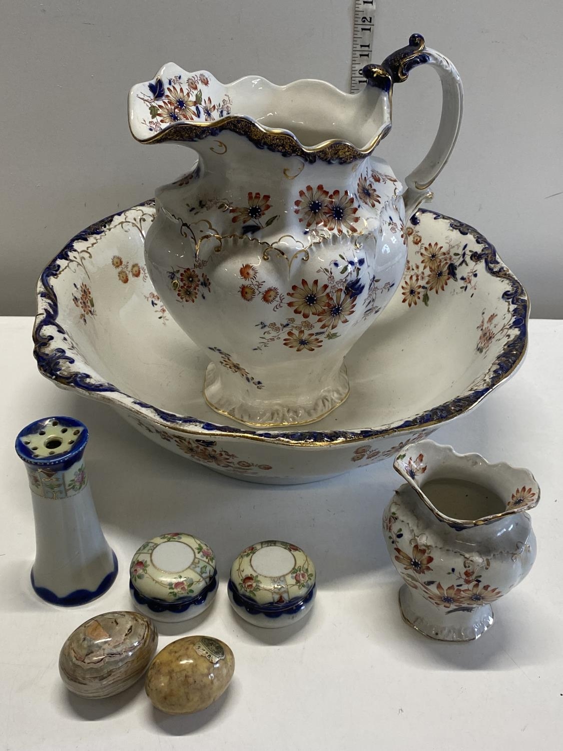 A antique jug and basin set with other ceramics.Shipping unavailable