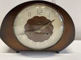 A vintage Smiths mantel clock with key.Shipping unavailable