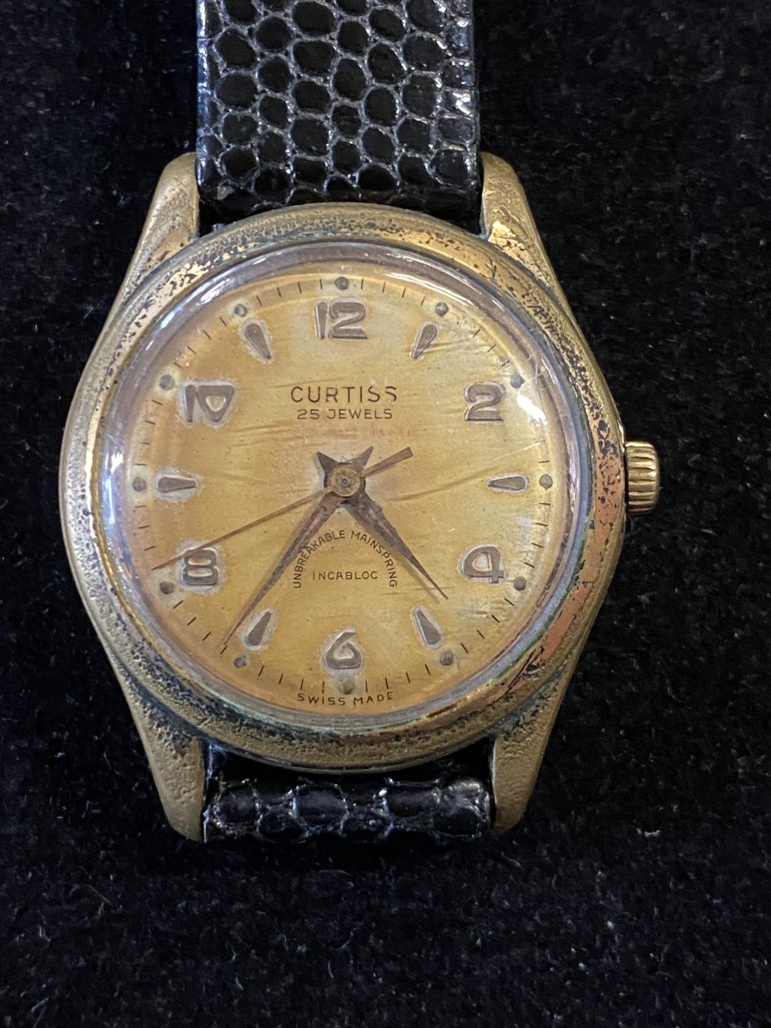 A vintage Curtiss 25 jewel gents wristwatch ticking at time of cataloguing