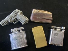 A selection of vintage lighters including Ronson and Polo