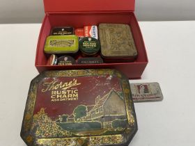 An assortment of vintage tins