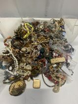 A job lot of costume jewellery including vintage and a Kigu compact Shipping unavailable