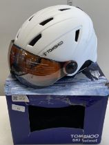 A boxed Tomshoo ski helmet.Shipping unavailable