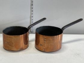 Two antique copper and cast iron pans, shipping unavailable