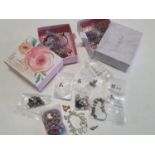 A large selection of costume charm bracelets and beads