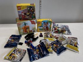 A job lot of assorted Lego models and figurines etc