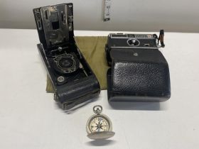 A vintage Kodak plate camera, compass and one other camera (untested)
