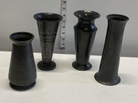 Four pewter vases