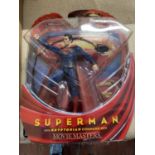 A boxed and sealed Superman figure by Movie Masters