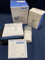Three boxed medical devices including blood pressure monitors, (untested) shipping unavailable