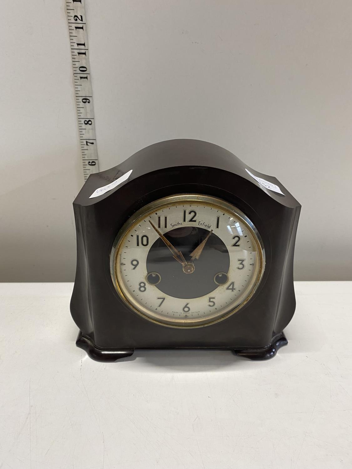 A vintage Bakelite mantle clock by Smiths Enfield with key and pendulum , shipping unavailable