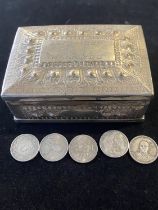 A Chinese white metal box with five Chinese Republic? coins