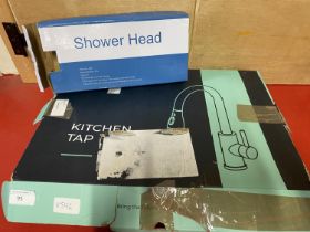 A boxed Kitchen tap and shower head (unchecked)