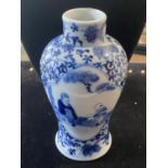 A Chinese Qing Dynasty blue and white porcelain vase signed to base