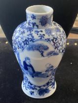 A Chinese Qing Dynasty blue and white porcelain vase signed to base