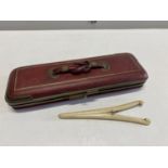 A Antique Art Deco leather glove case complete with stretchers