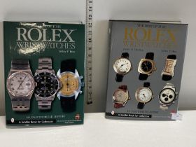 Two hardback Schiffer Rolex watch guidebooks "The best of time Rolex wristwatches, an unauthorised