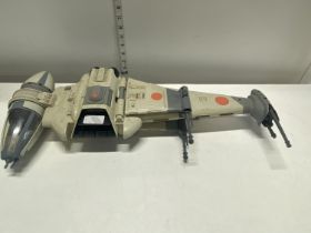 A 1984 Star Wars B Wing model by Kenner