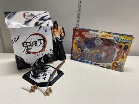 A Japanese figure and one other boxed Japanese toy (unchecked)
