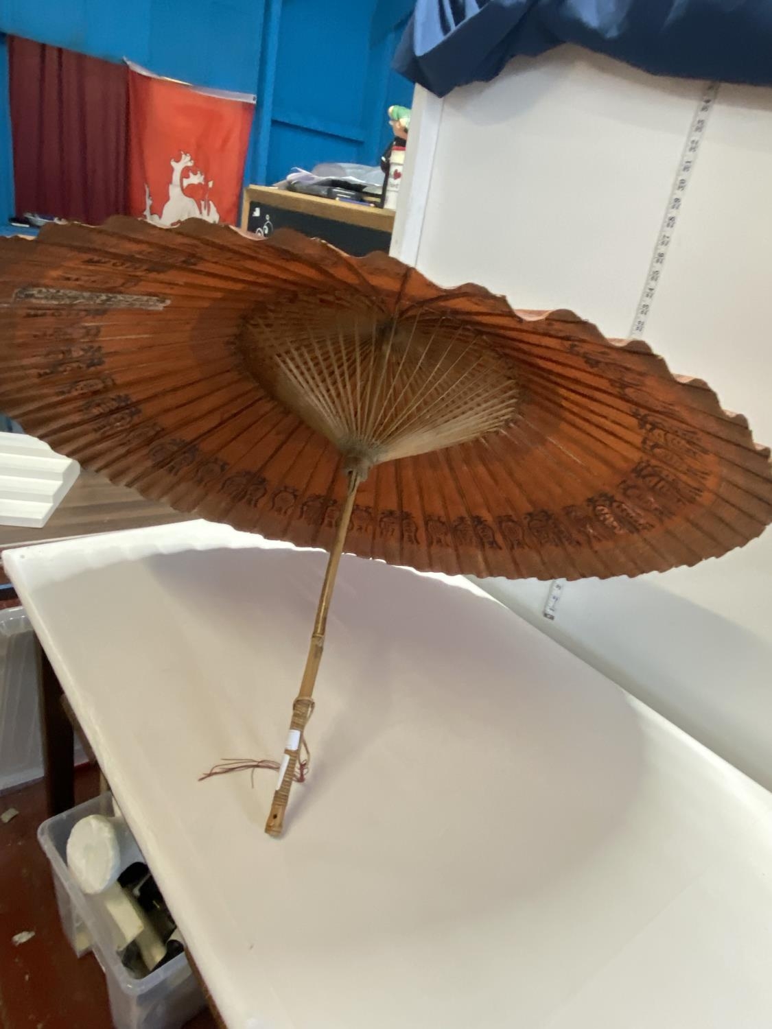 A vintage Oriental bamboo and rice paper parasol, shipping unavailable