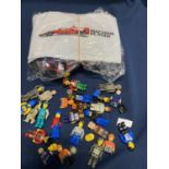 A selection of Lego style figures and a Lego Style racing car building set (unchecked)