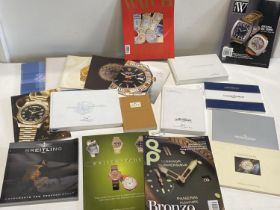 A job lot of assorted sales brochures and other books relating to high end watches including