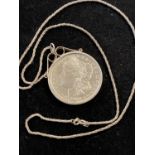 A 1878 Morgan silver Dollar in a 925 silver mount with chain