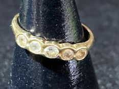A 9ct gold and five white stone ring. 1.65 grams