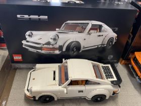A Lego Porsche 911 model 10295, with original box etc, shipping unavailable
