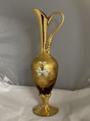 A quality hand decorated Murano glass ewer with gilt decoration.40cm tall.