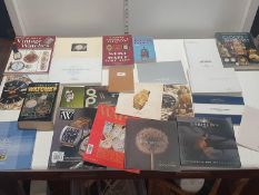 A job lot of assorted hardback books and other all relating to wrist watches and time pieces,