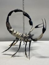 A unusual large hand carved horn model in the form of a Scorpion (does dismantle). Shipping